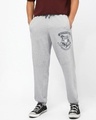 Shop Men's Grey Melange Hogwarts Graphic Printed Oversized Joggers-Front