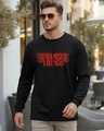 Shop Men's Jet Black Stranger Things Logo Typography Oversized T-shirt-Front