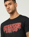 Shop Men's Jet Black Stranger Things Typography T-shirt