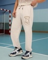 Shop Men's Light Beige Melange Hogwarts Printed Oversized Joggers-Front