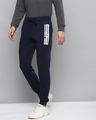 Shop Men's Navy Blue Solid Slim Fit Joggers With Printed Detail-Design