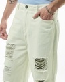 Shop Men's Off White Tapered Fit Distressed Jeans