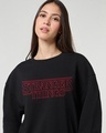 Shop Women's Black Stranger Things Typography Oversized Sweatshirt