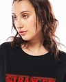 Shop Women's Jet Black Stranger Things Logo Typography Oversized T-shirt