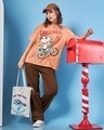 Shop Women's Orange Snoopy Cruisin Graphic Printed Oversized Acid Wash T-shirt