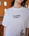 Shop Women's White Attempting To Adult Graphic Printed Oversized T-shirt