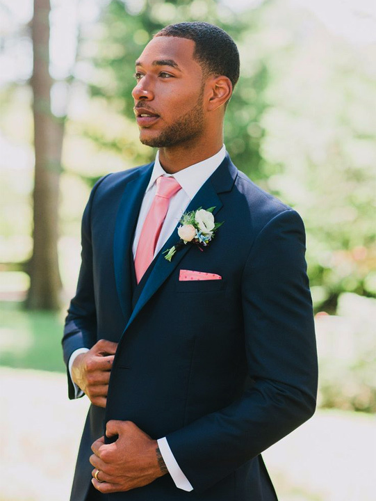 blue suit white shirt purple tie