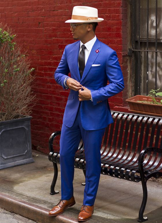 blue suit with red shoes