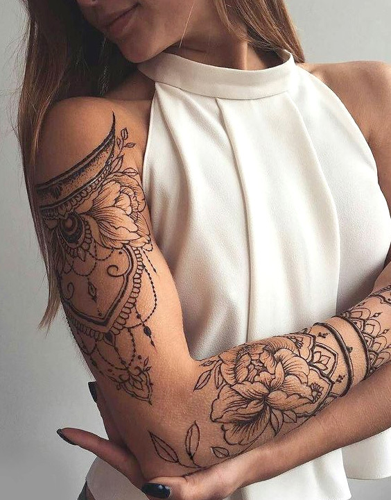 A woman with a tattoo on her arm photo  Free Brown Image on Unsplash