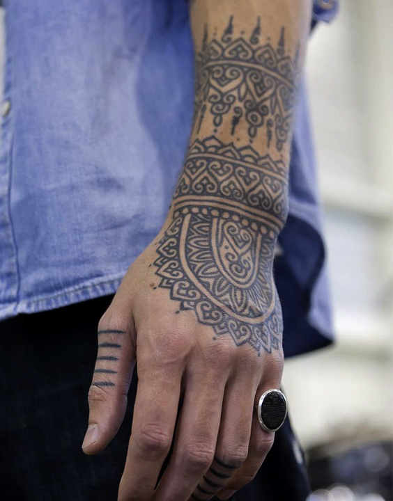 Everything You Wanted to Know About Hand and Finger Tattoos But Were Afraid  to Ask