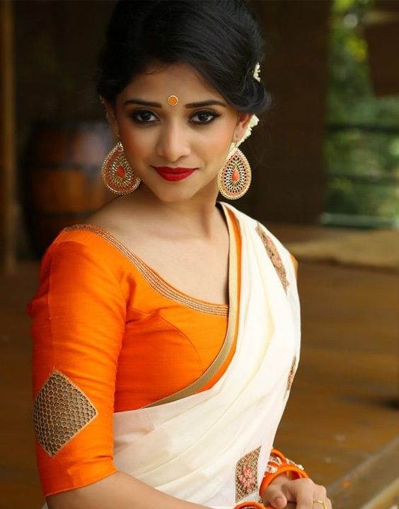 RE - Classy Party-wear Orange Georgette Saree with UN-stitch Blouse