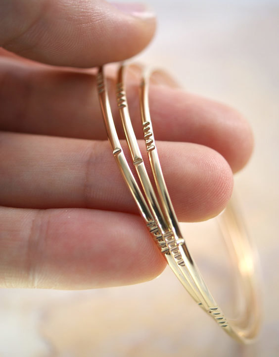 Gold bangles with copper on sale inside