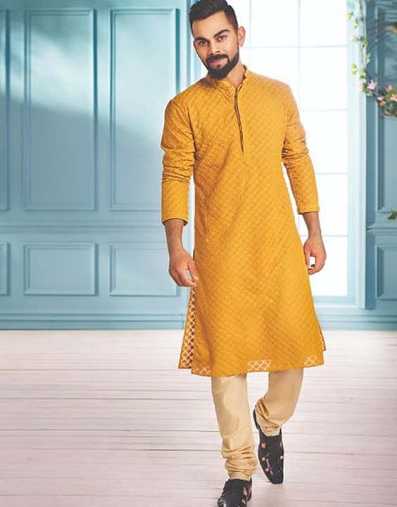 MUSTARD LAYERED LEHNGA CHOLI -WAHAJMKHAN