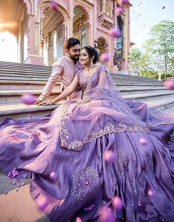 Photo of Bride posing in bright pink gota patti lehenga