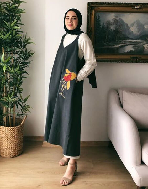 overall dress or jumpsuit with a hijab