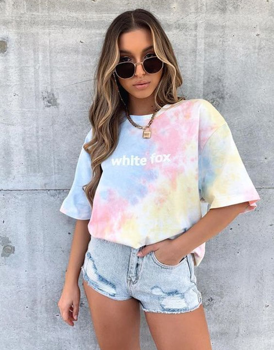 tie-dye t-shirt and denim shorts